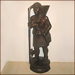 Traveller woman ethnic philippine wood design